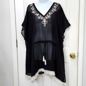 Swim cover-up NWOT black sheer one-size with dolman sleeve.  Never worn